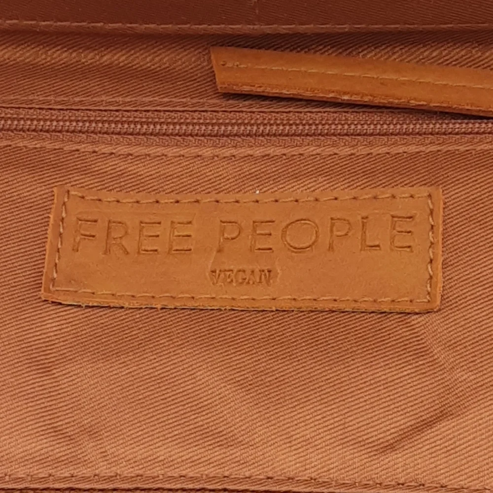 Free People Brown Vegan Wristlet Clutch.